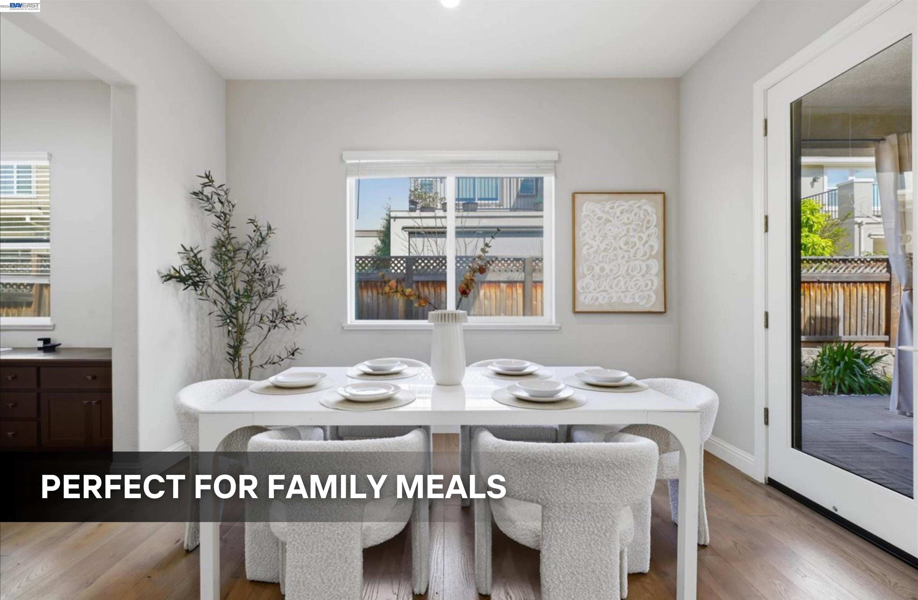 39438 Humpback Whale Road Newark, CA 94560 - Photo 13 of 51 a view of a dining room with furniture window and wooden floor