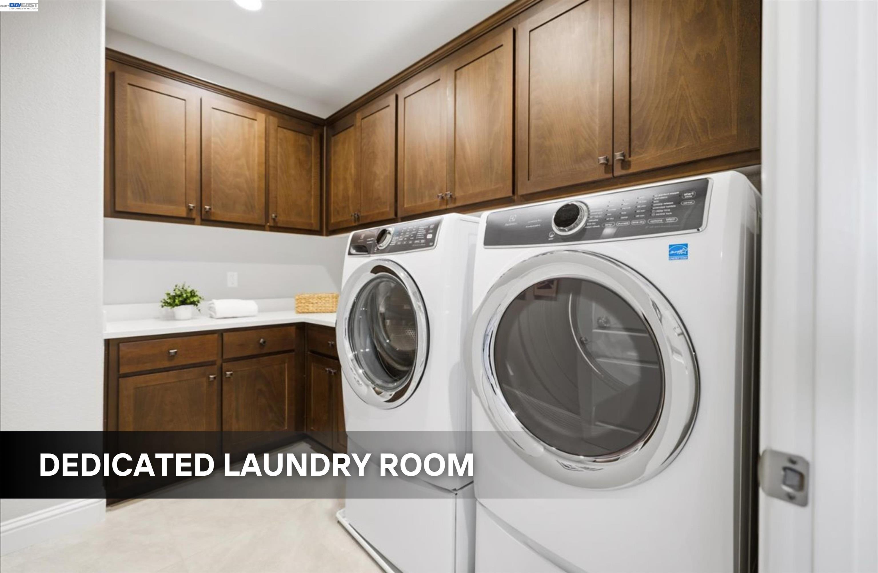 39438 Humpback Whale Road Newark, CA 94560 - Photo 18 of 51 a utility room with sink dryer and washer