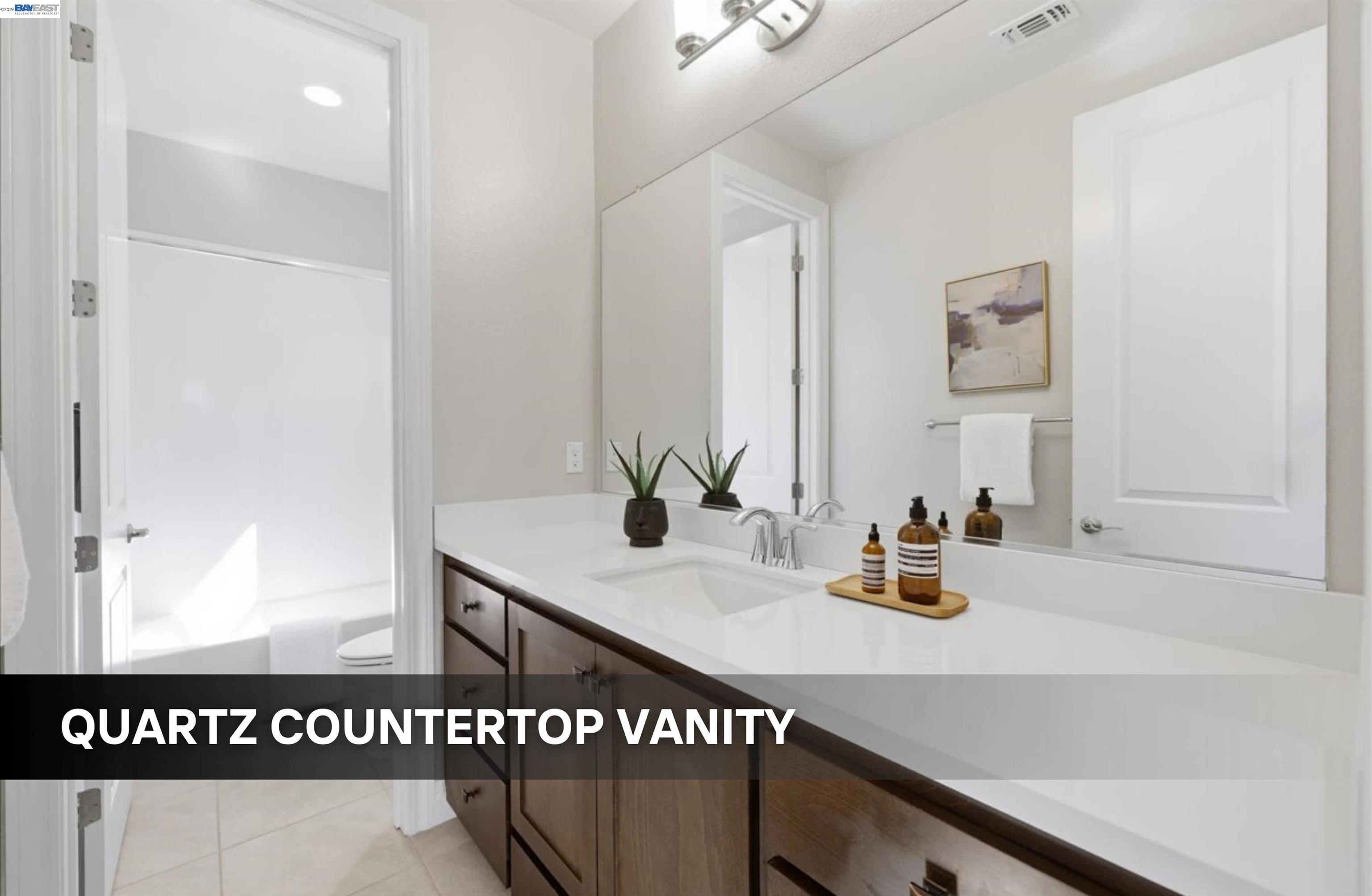 39438 Humpback Whale Road Newark, CA 94560 - Photo 23 of 51 a bathroom with a sink and a mirror