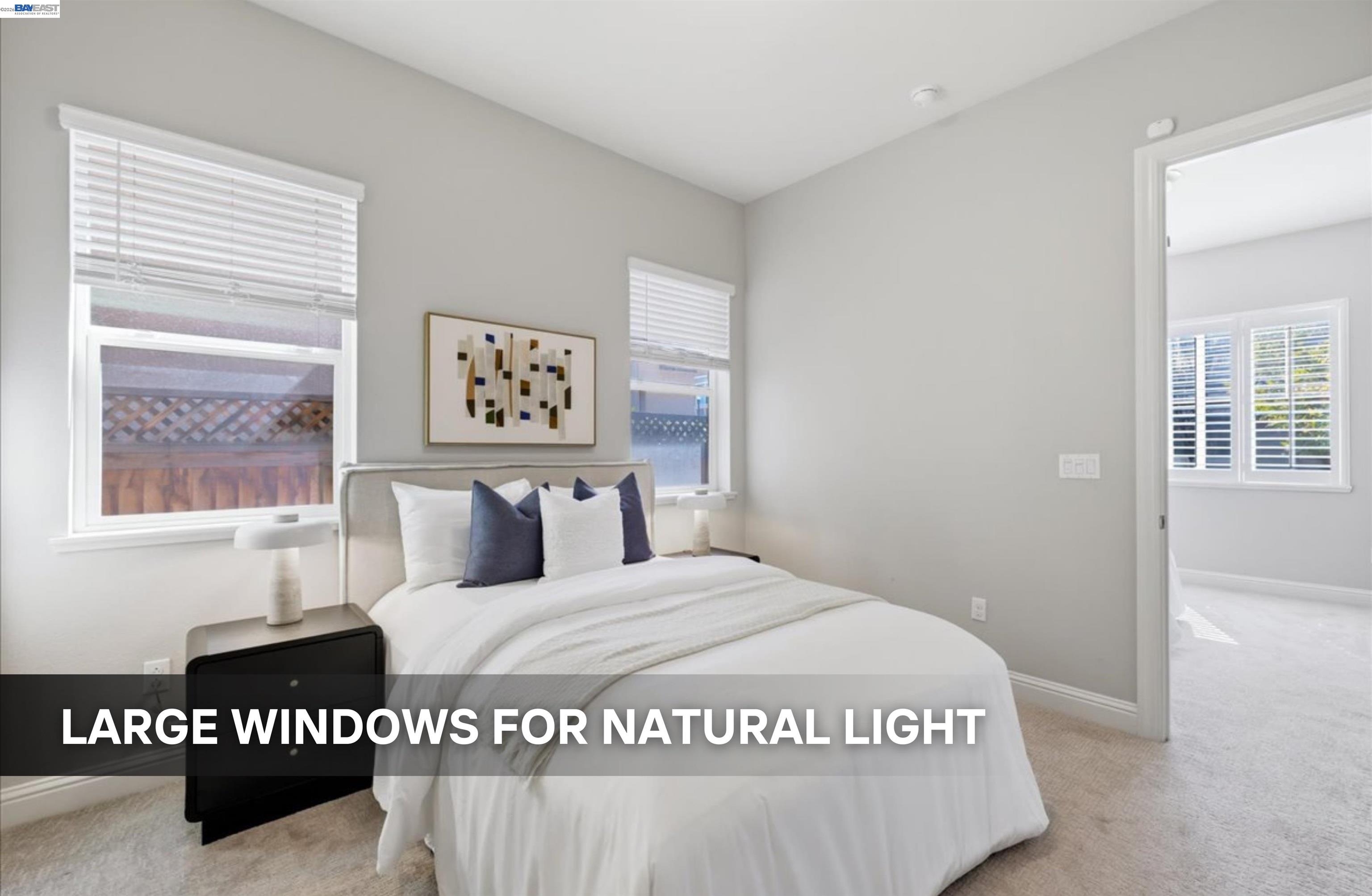 39438 Humpback Whale Road Newark, CA 94560 - Photo 41 of 51 a bedroom with a bed and a table