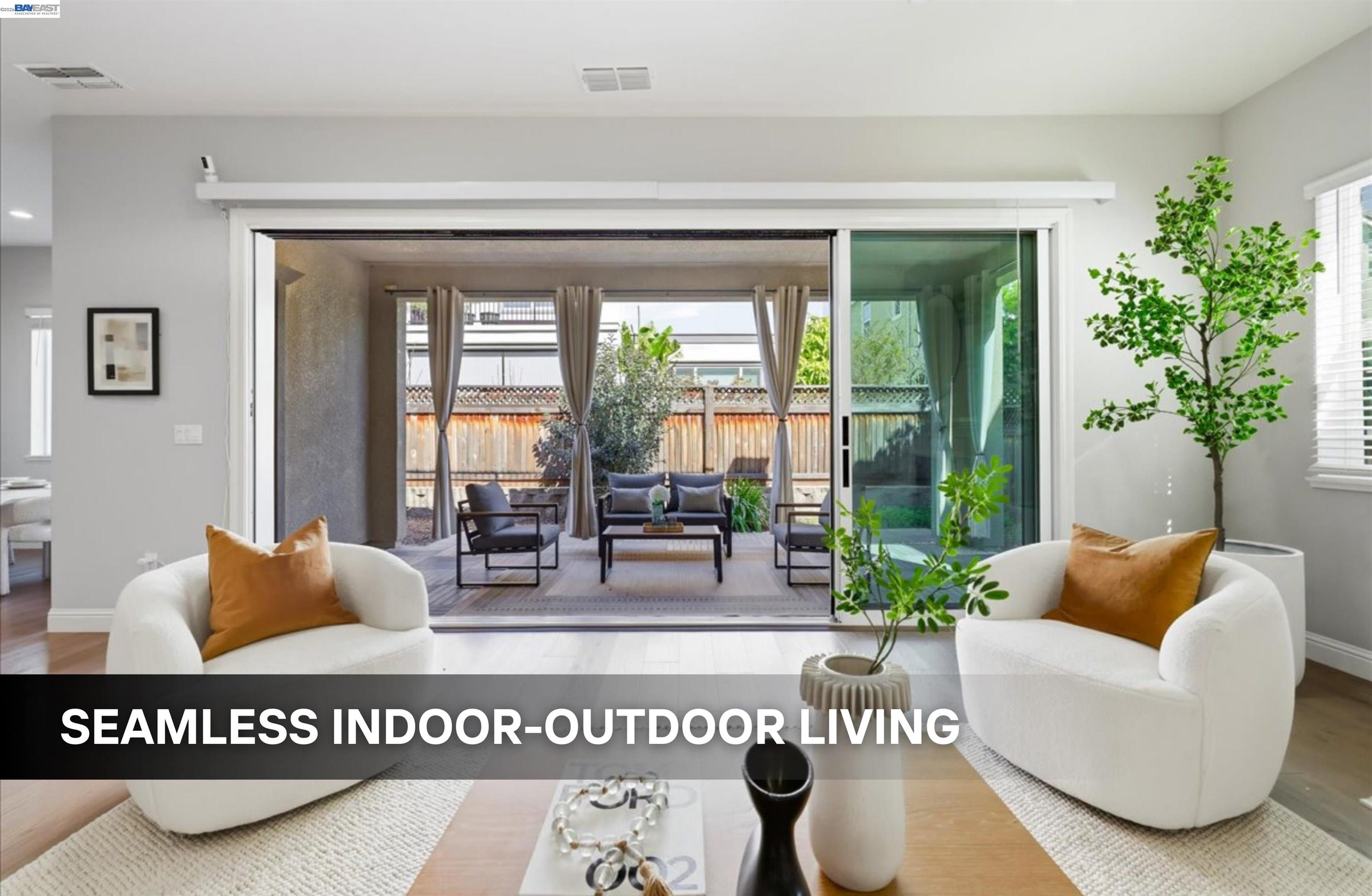 39438 Humpback Whale Road Newark, CA 94560 - Photo 6 of 51 a living room with furniture and a large window