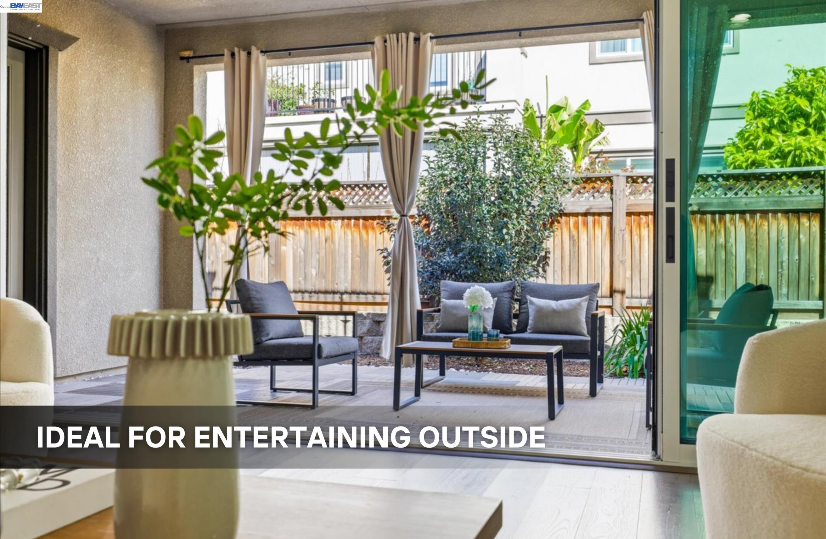 39438 Humpback Whale Road Newark, CA 94560 - Photo 8 of 51 a view of living room filled with furniture and a potted plant