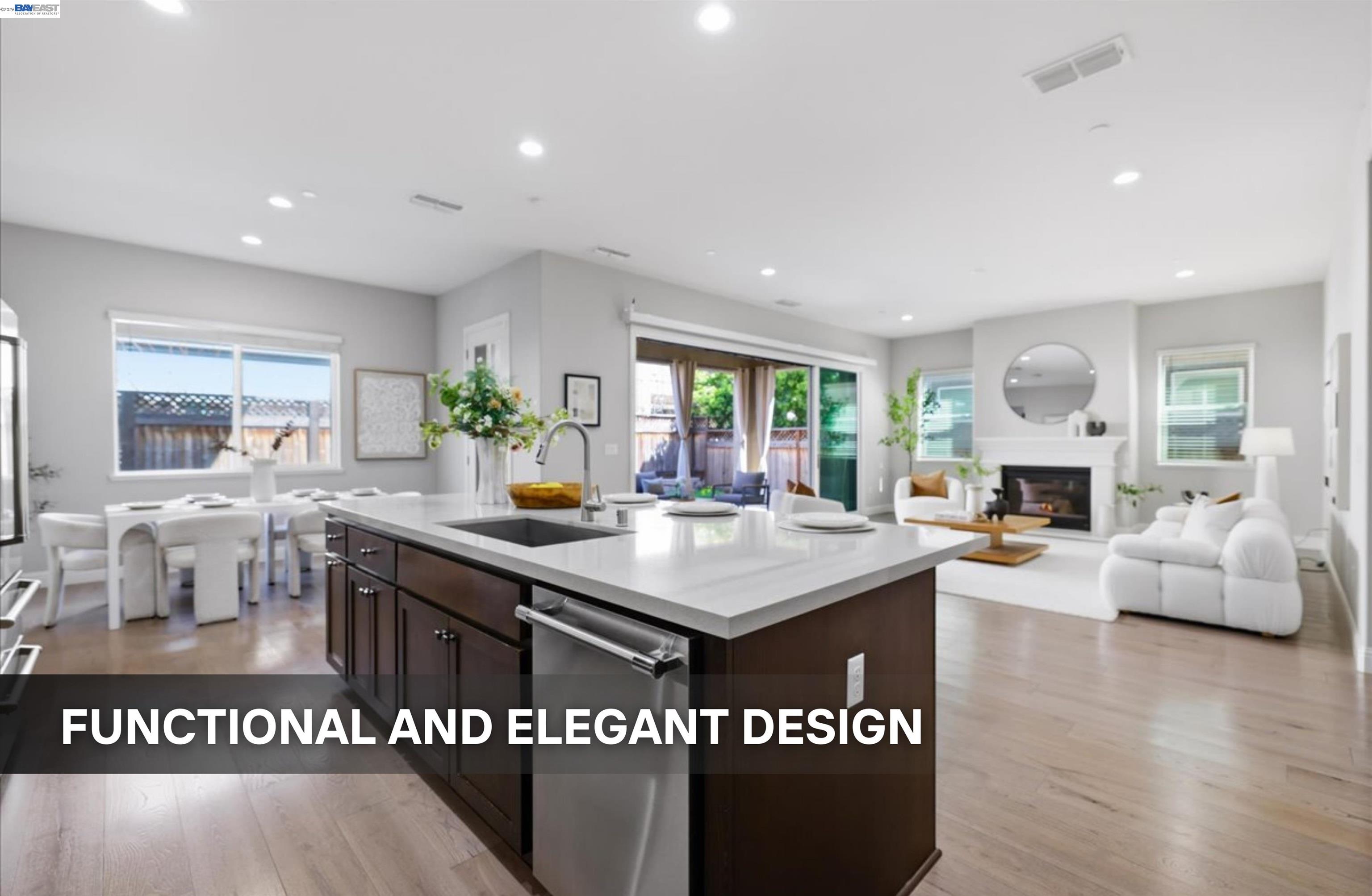 39438 Humpback Whale Road Newark, CA 94560 - Photo 10 of 51 a view of living room kitchen with furniture and fireplace