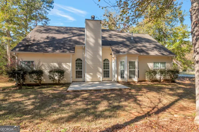 a view of a house with a patio