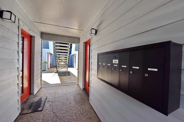 a view of gallery with windows