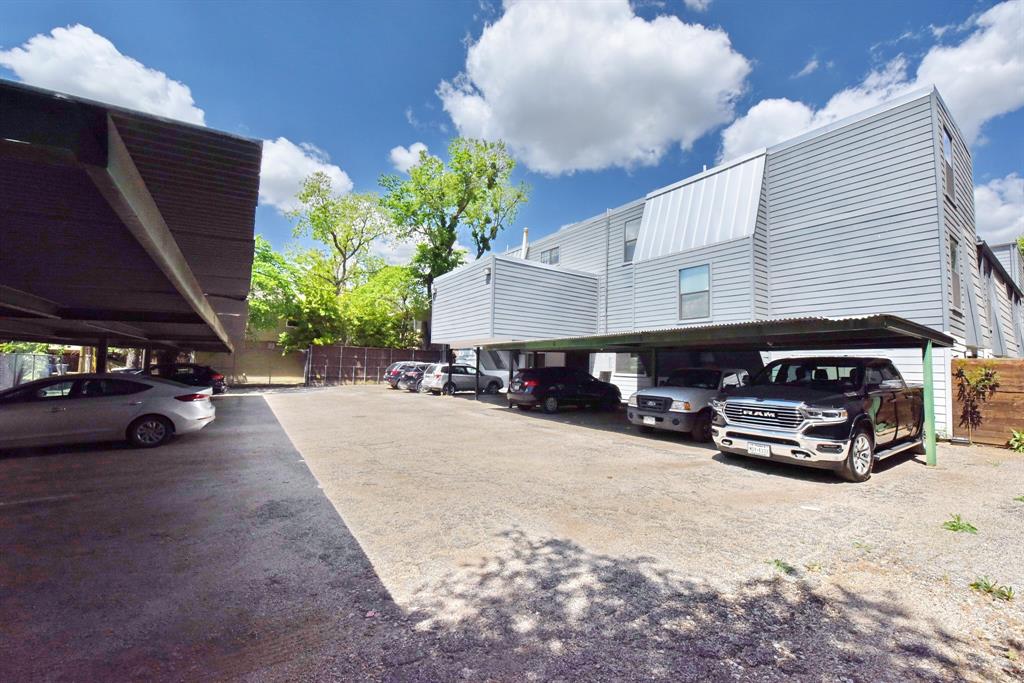 4033 Gilbert Avenue, Unit 206 Dallas, TX 75219 - Photo 9 of 18 a car parked in front of a building