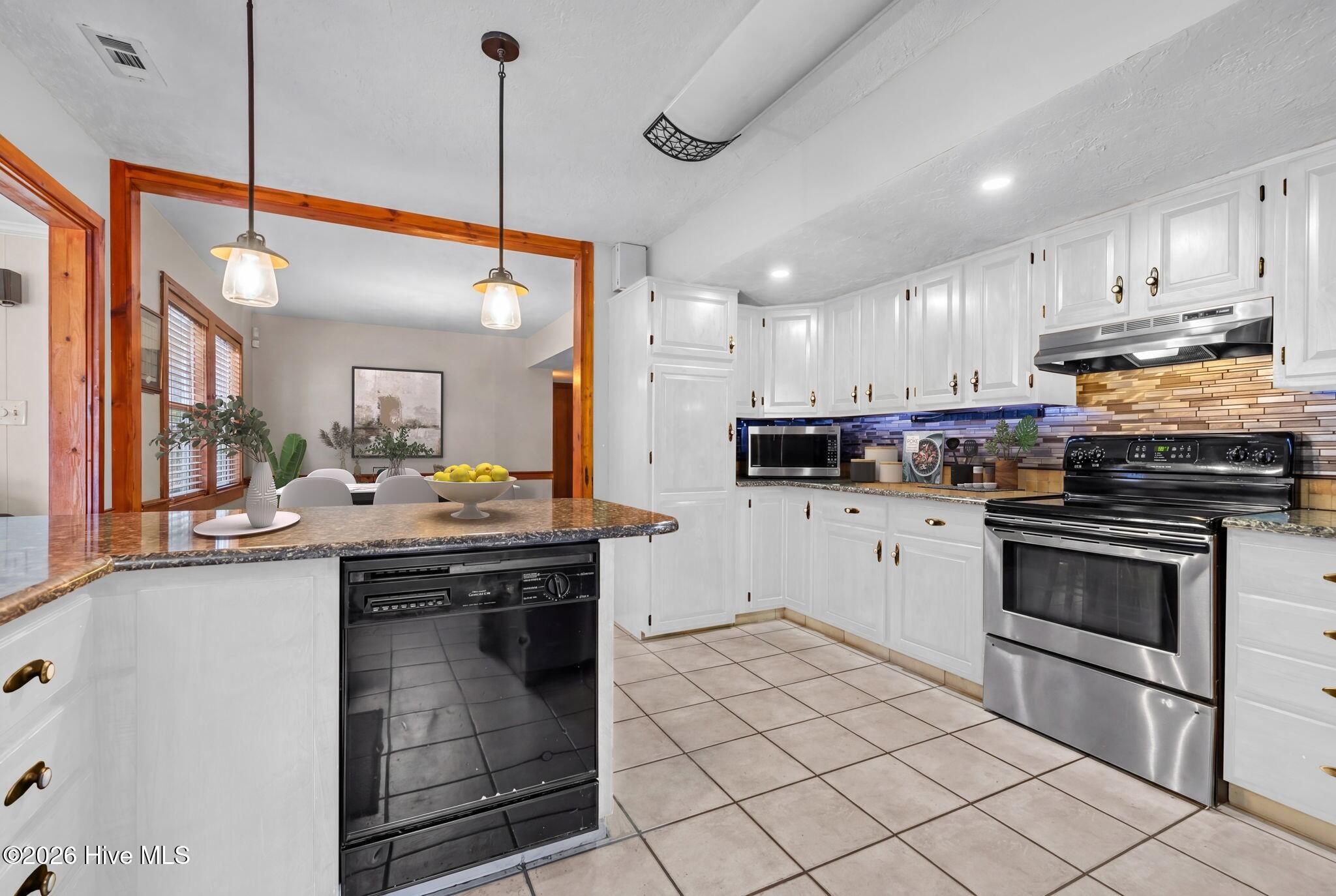 218 Old Ironsides Road Newport, NC 28570 - Photo 62 of 64 62-web-or-mls-Kitchen and dining