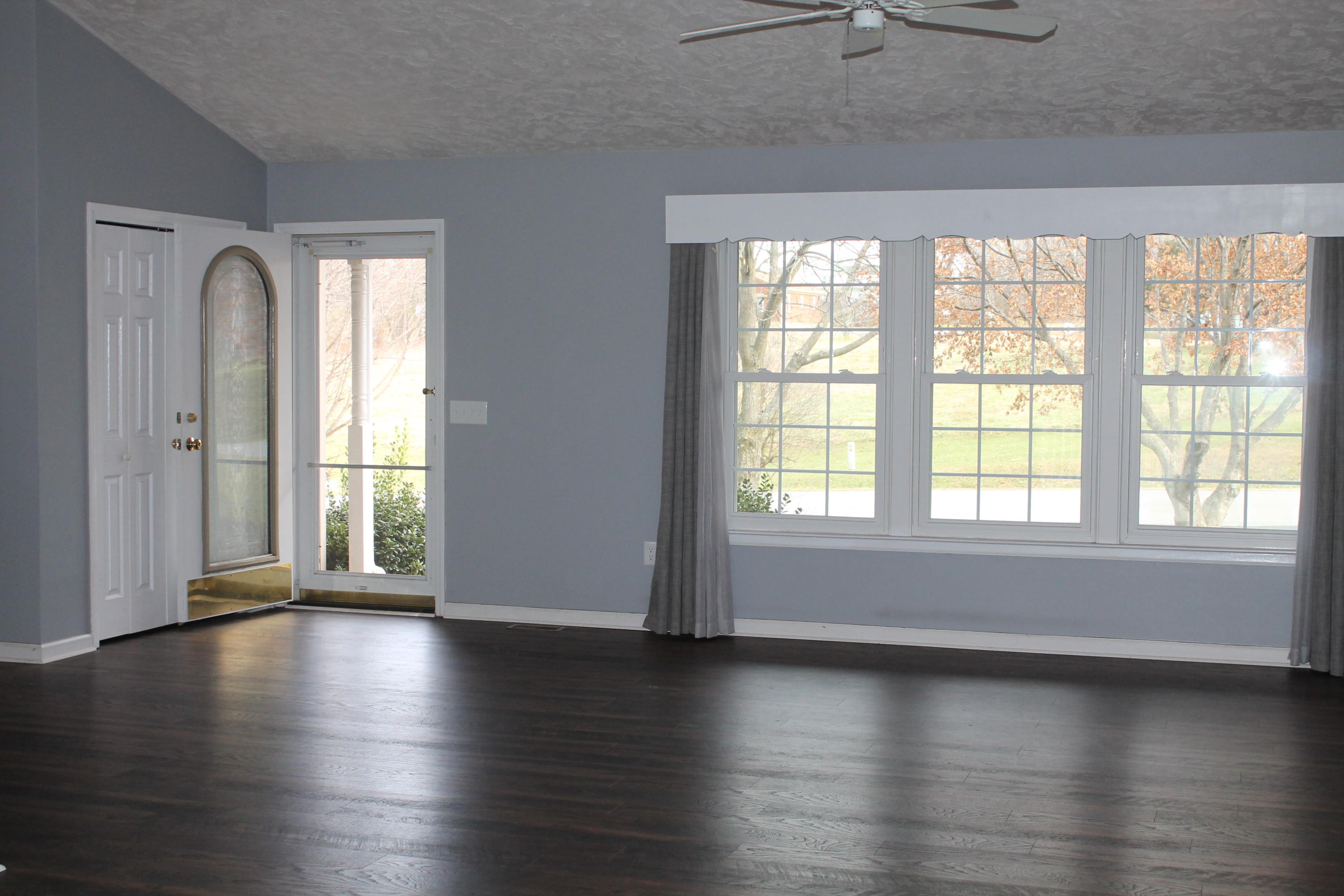 101 Aftons Meadow Road Vinton, VA 24179 - Photo 21 of 55 a view of an empty room with wooden floor and a window