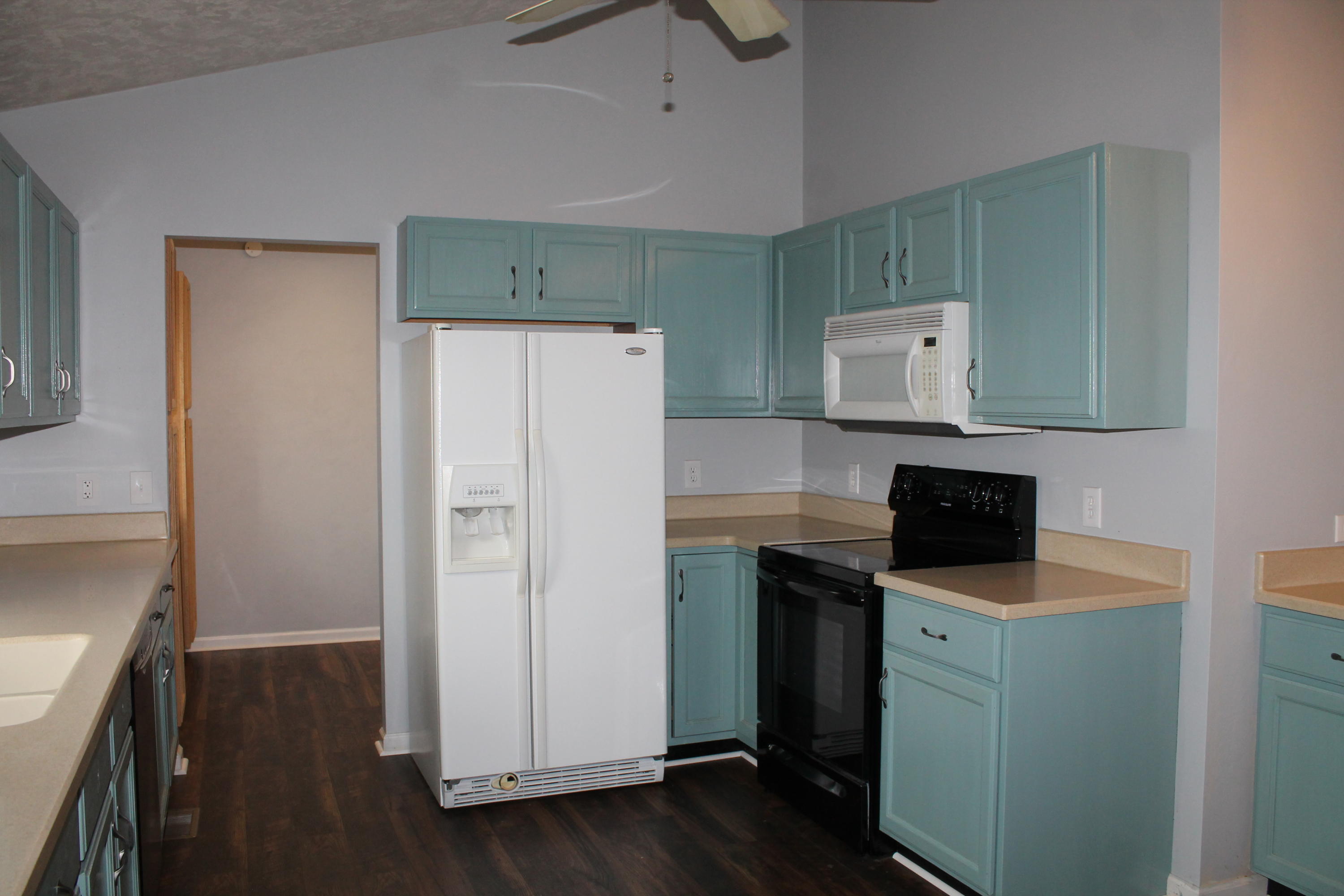 101 Aftons Meadow Road Vinton, VA 24179 - Photo 27 of 55 a kitchen with a refrigerator sink and cabinets