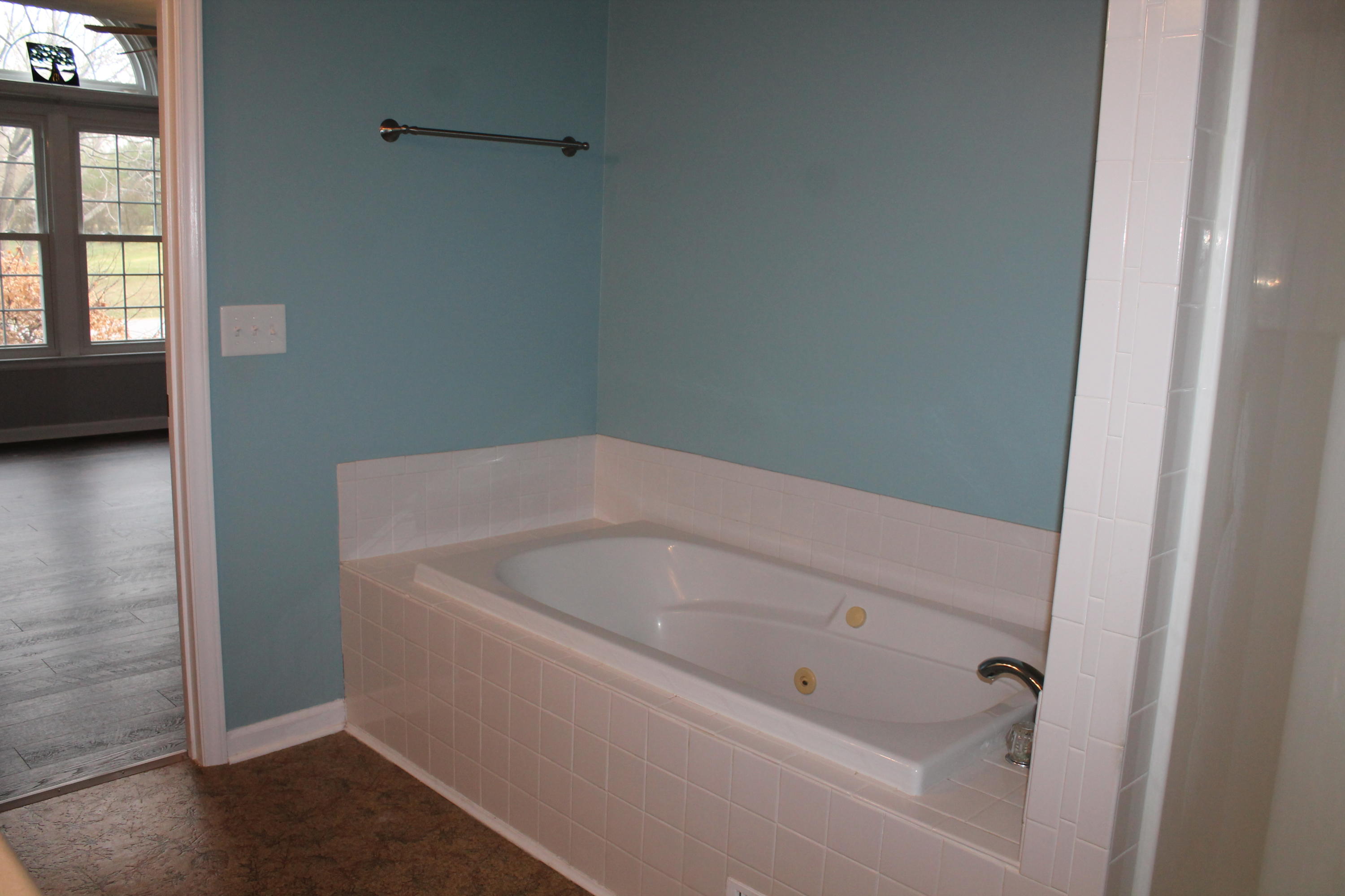101 Aftons Meadow Road Vinton, VA 24179 - Photo 35 of 55 a white bath tub sitting in a bathroom