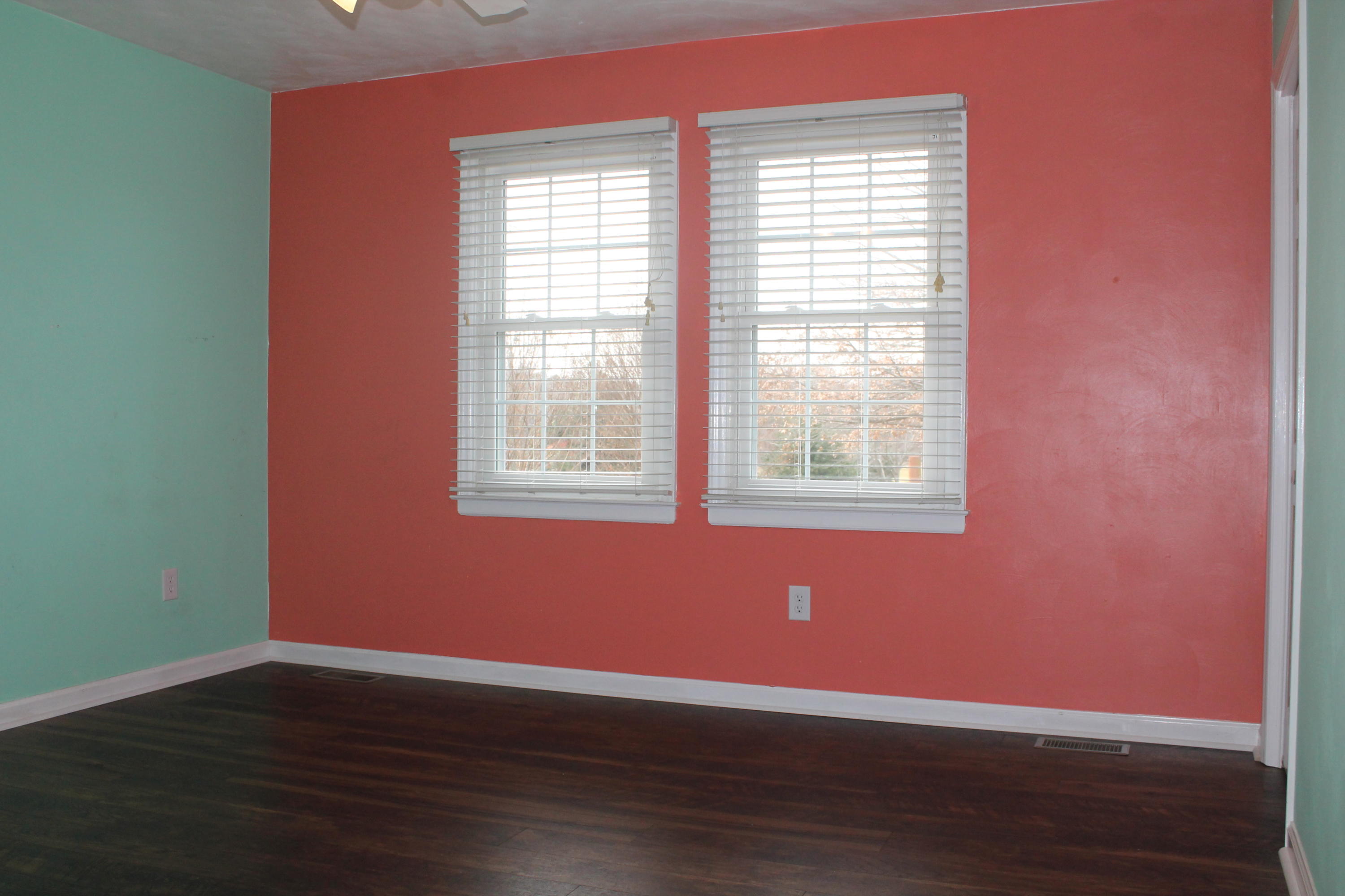 101 Aftons Meadow Road Vinton, VA 24179 - Photo 37 of 55 a view of an empty room with wooden floor and a window