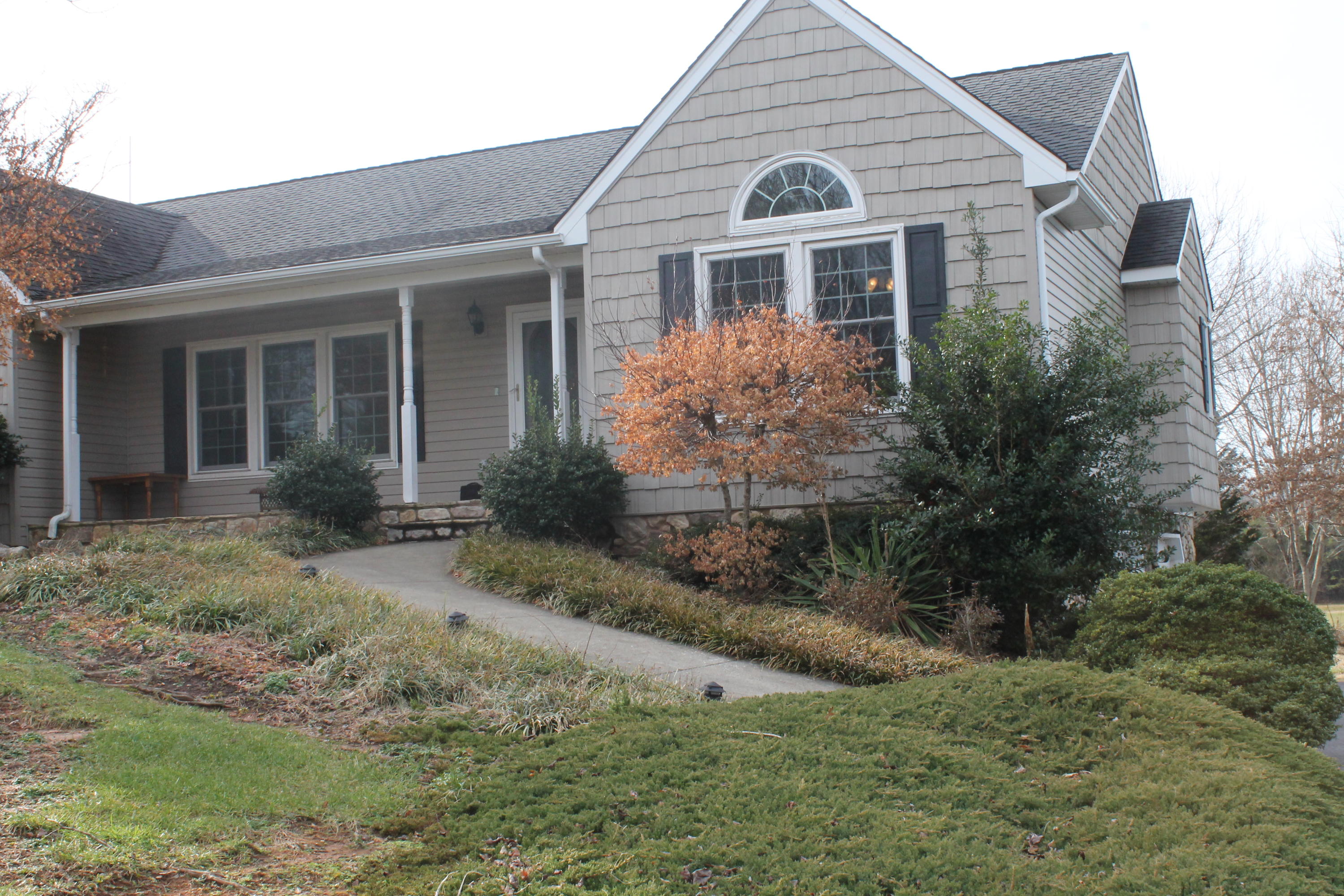 101 Aftons Meadow Road Vinton, VA 24179 - Photo 9 of 55 a front view of a house with a yard and garage