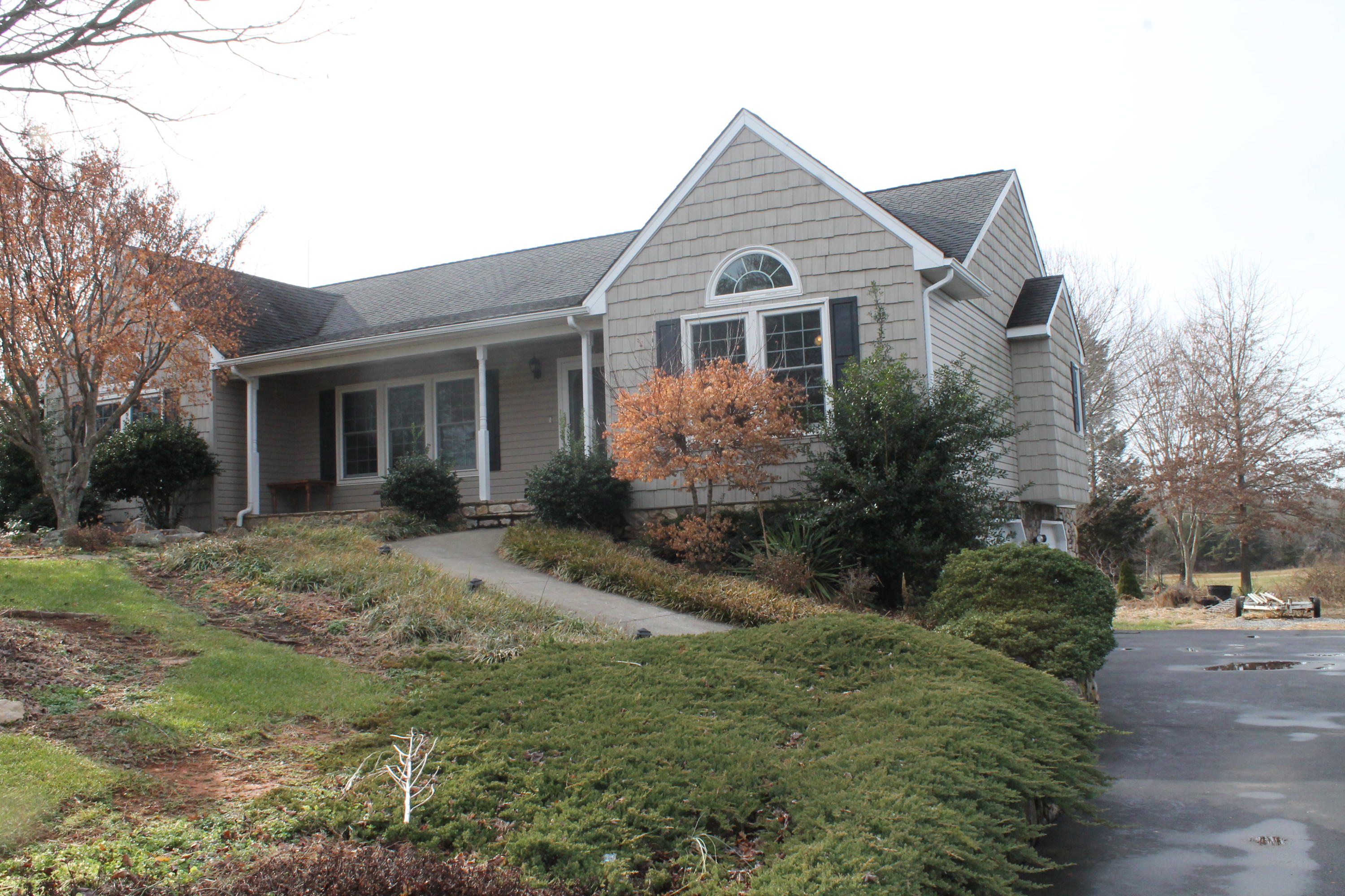 101 Aftons Meadow Road Vinton, VA 24179 - Photo 10 of 55 a front view of a house with a yard and trees