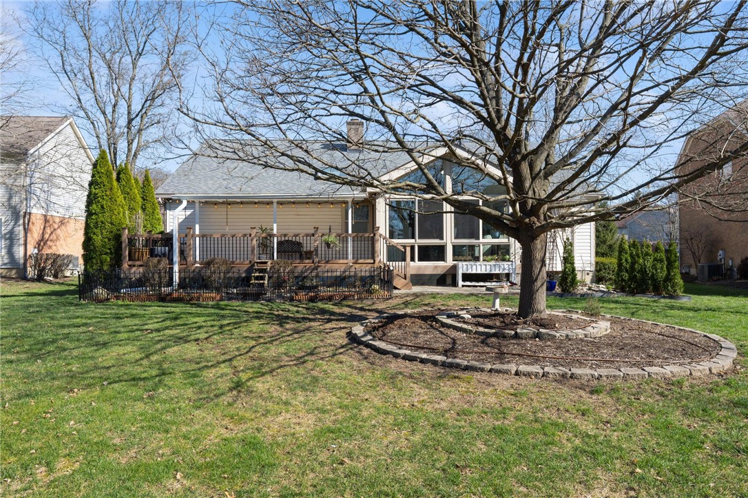 8781 Rupp Farm Drive West Chester, OH 45069 - Photo 45 of 48 This residence features a deck and expansive windows, offering a bright and inviting atmosphere.