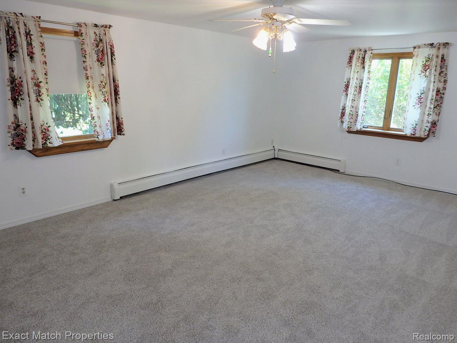 2980 East Rose Center Road Highland, MI 48356 - Photo 47 of 72 Extra large upper level bedroom suite