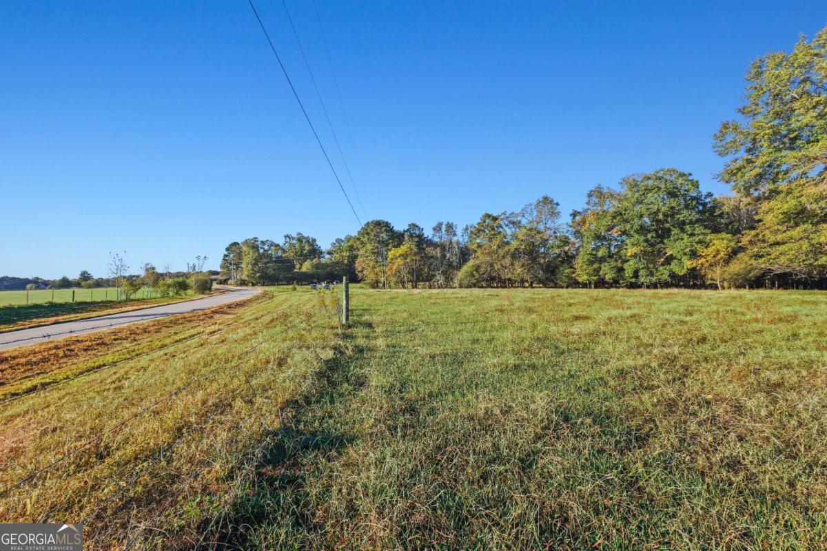 1210 Carson-Graves Road, Unit 2B Watkinsville, GA 30677 - Photo 6 of 14 a view of a field with an ocean