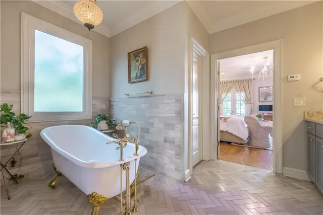 a bathroom with a bathtub and a sink