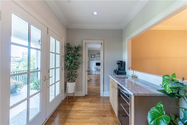 a kitchen with stainless steel appliances a sink and cabinets