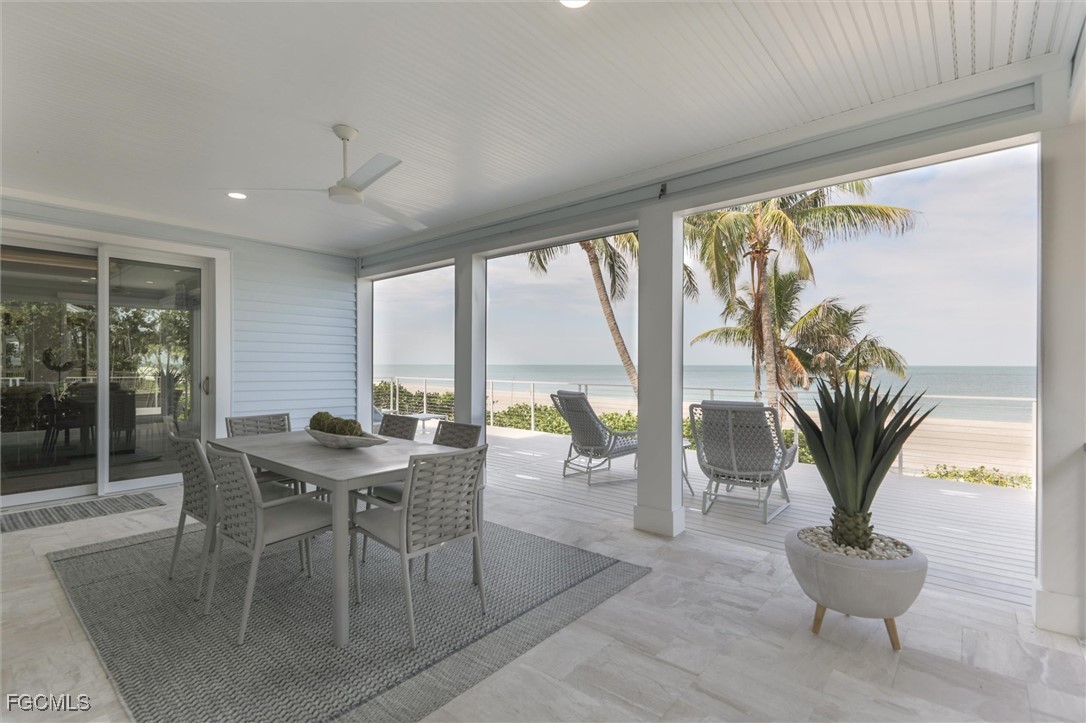 941 South Seas Plantation Road Captiva, FL 33924 - Photo 33 of 50 a living room with furniture and a potted plant