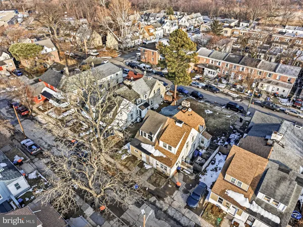 an aerial view of a house with a ocean view