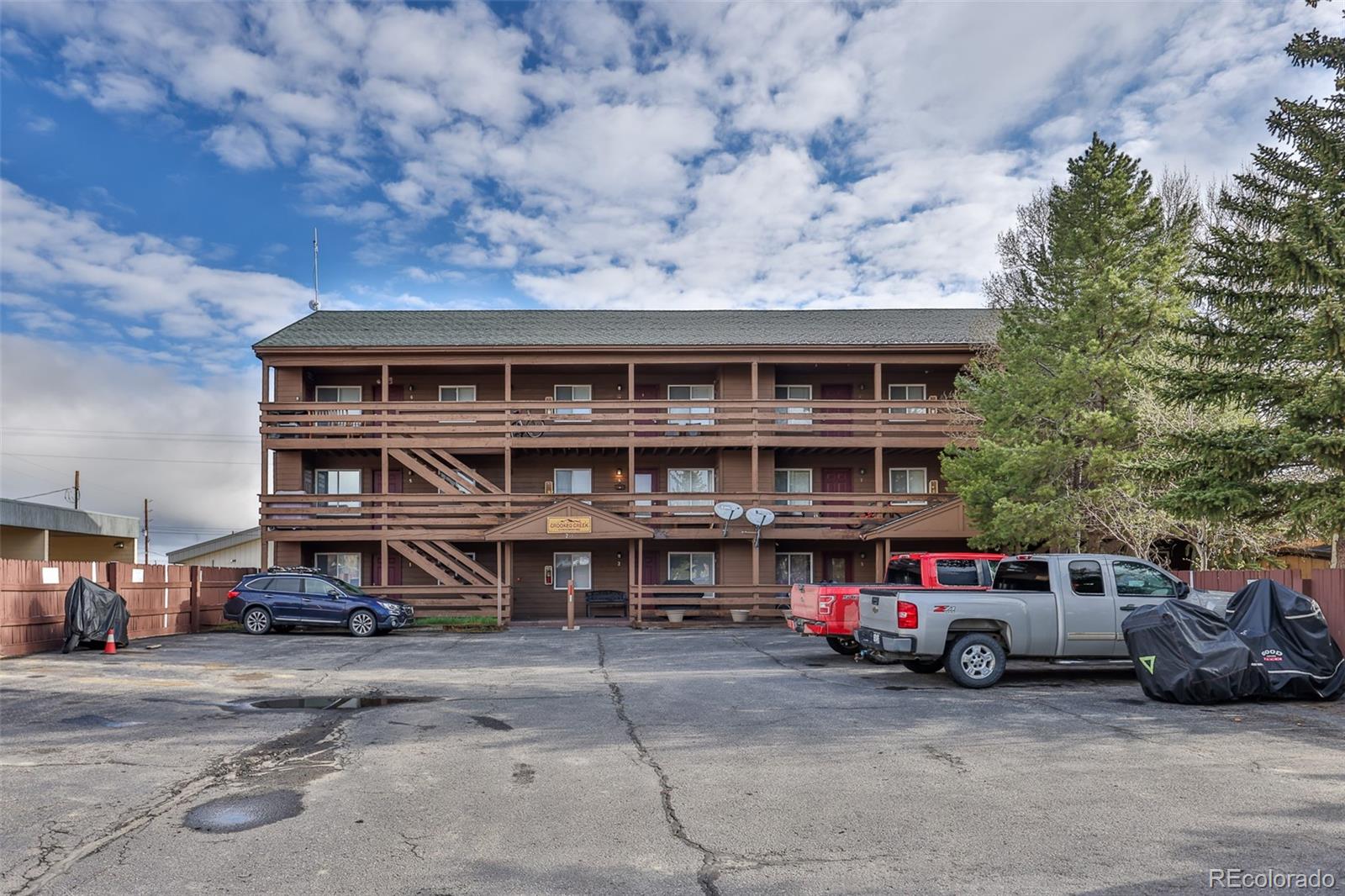 233 Fraser Avenue, Unit R1 Fraser, CO 80442 - Photo 22 of 23 a view of a car park in front of house