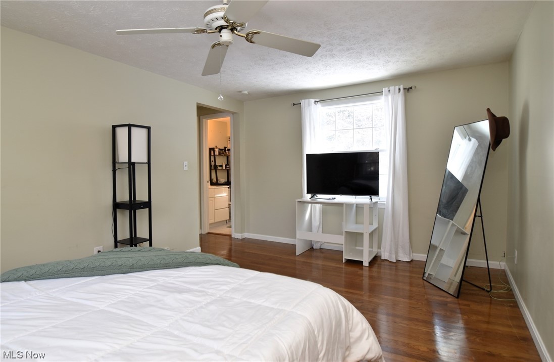 11801 Heath Road Chesterland, OH 44026 - Photo 14 of 21 Master Bedroom with dark hardwood floors, ceiling fan