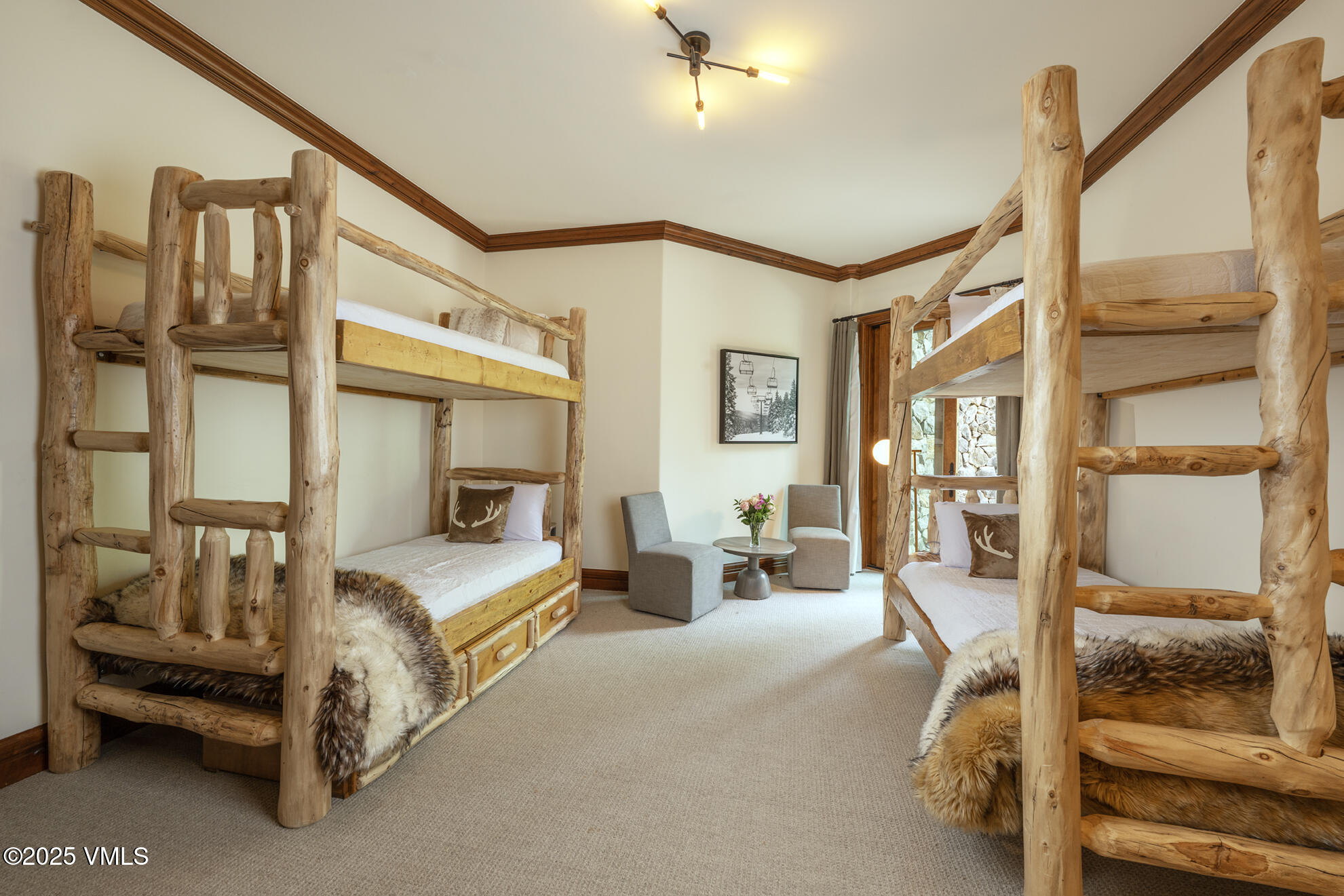 185 Forest Road Vail, CO 81657 - Photo 13 of 13 a bedroom with furniture and a window
