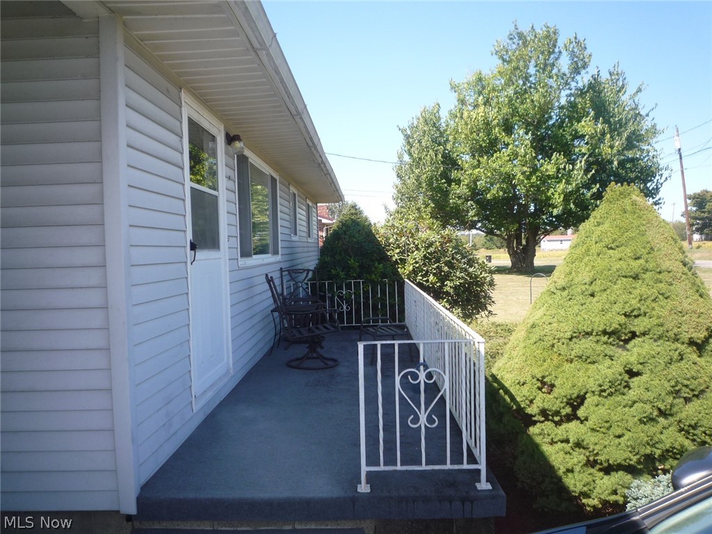 78 Holdren Road Little Hocking, OH 45742 - Photo 10 of 25 Relax on the front porch.....it's in the shade from about noon on.