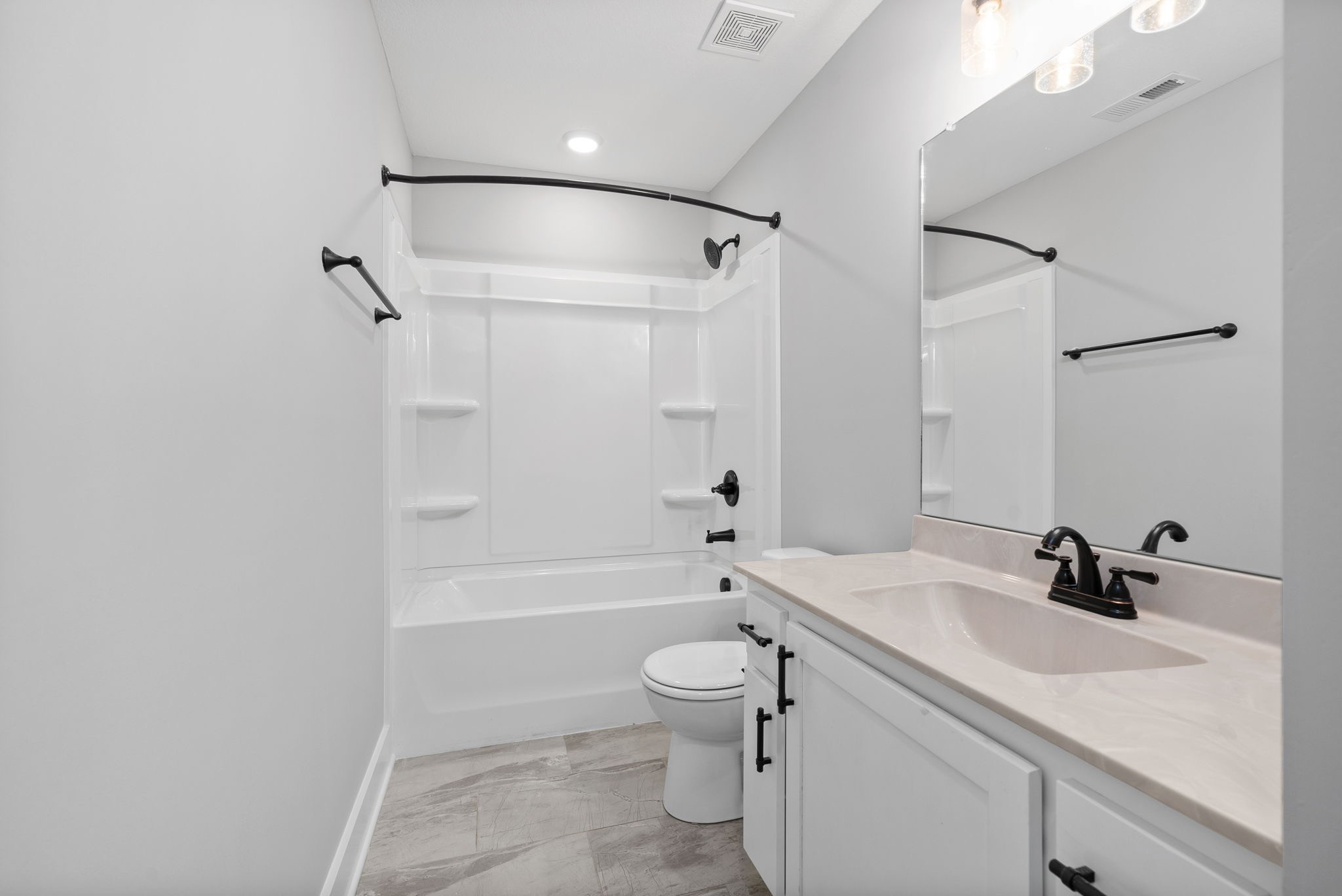 1385 L Bumpus Road Clarksville, TN 37040 - Photo 13 of 28 a bathroom with a sink a toilet and shower