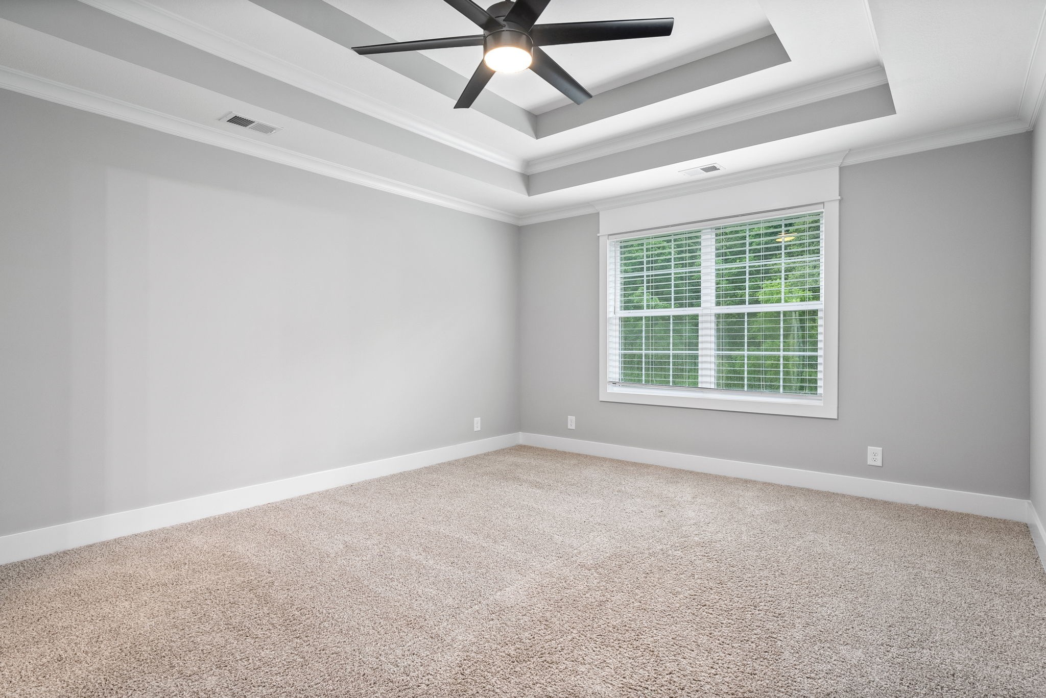 1385 L Bumpus Road Clarksville, TN 37040 - Photo 16 of 28 an empty room with a window and a fan