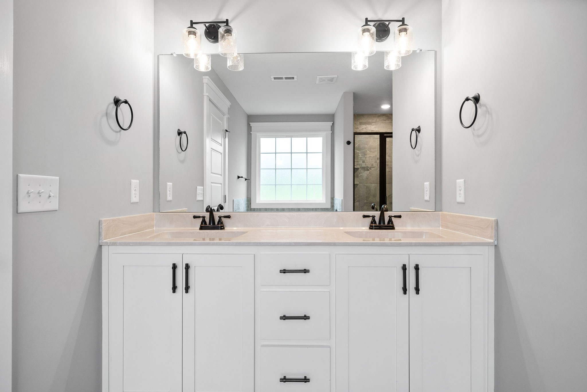 1385 L Bumpus Road Clarksville, TN 37040 - Photo 19 of 28 a bathroom with double sink and a mirror