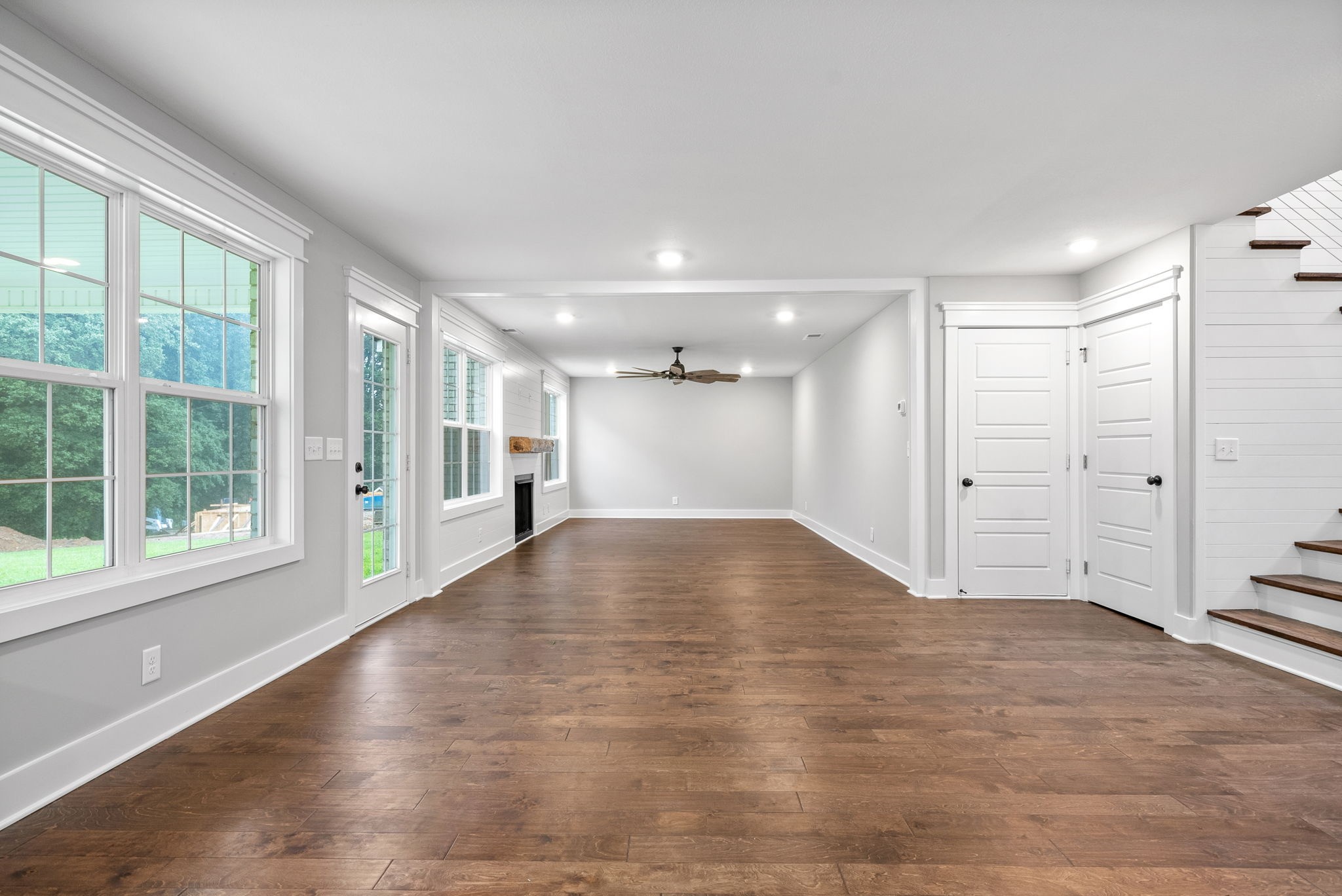 1385 L Bumpus Road Clarksville, TN 37040 - Photo 5 of 28 a view of empty room with wooden floor and fan