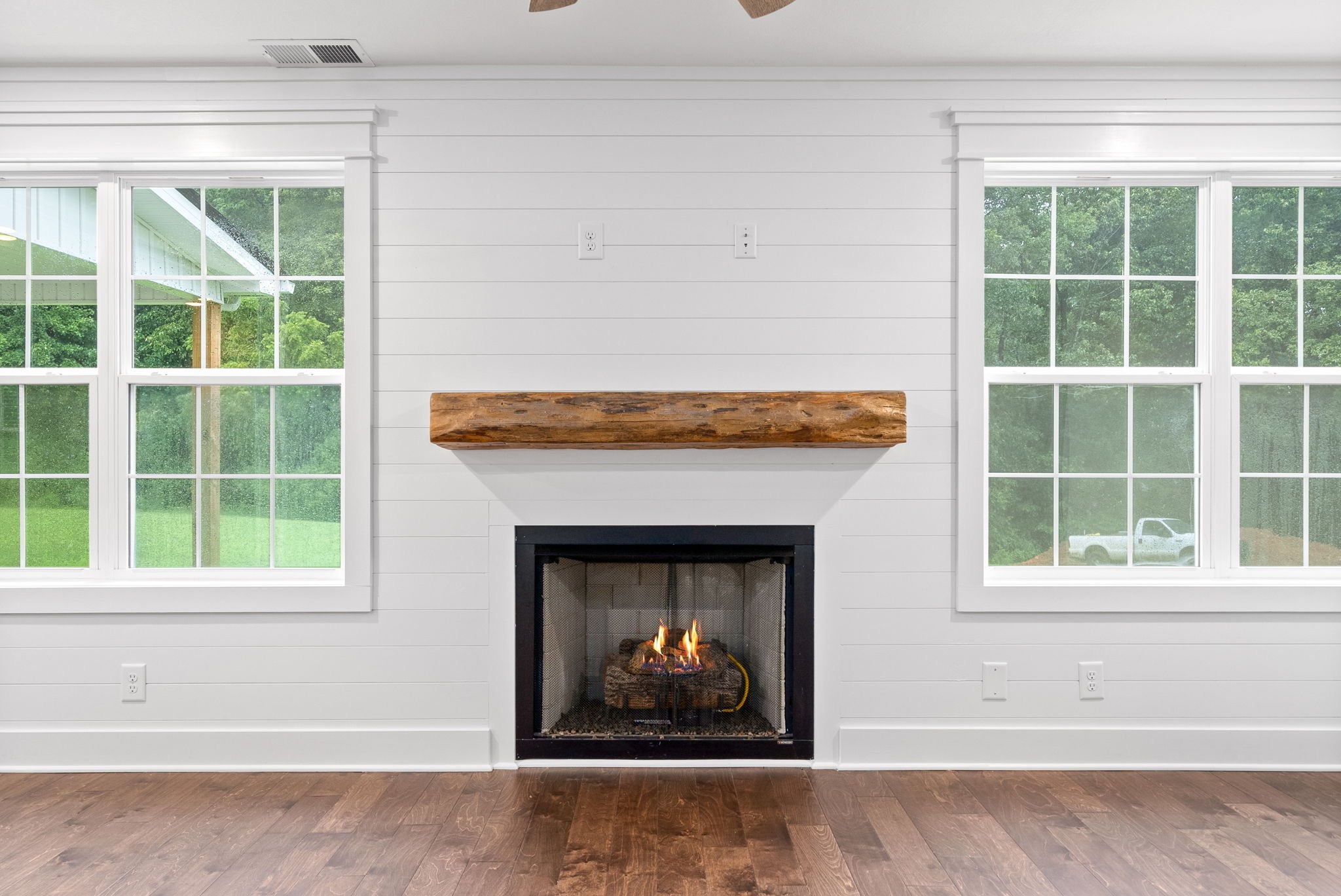 1385 L Bumpus Road Clarksville, TN 37040 - Photo 7 of 28 a living room with a fireplace and a window