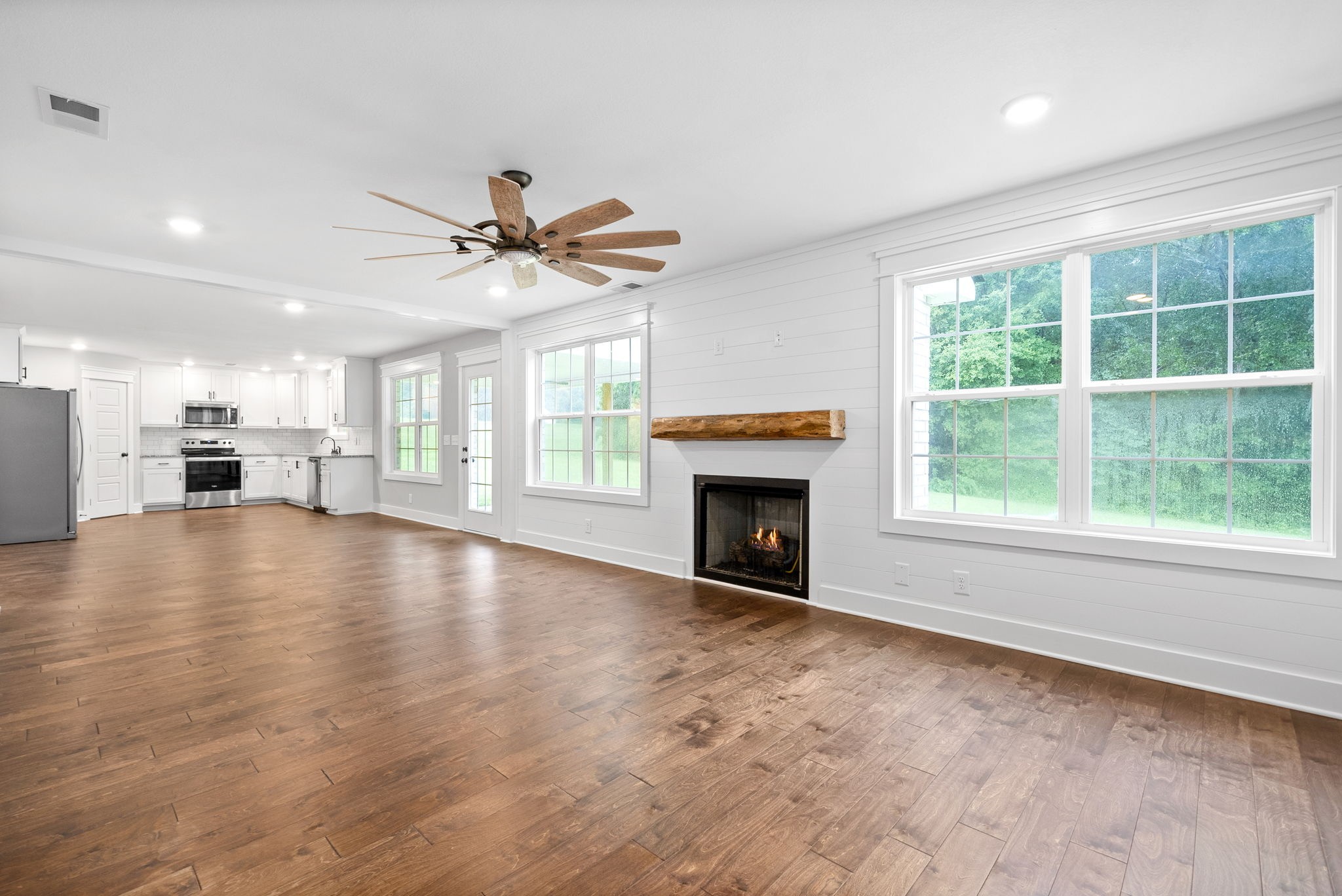 1385 L Bumpus Road Clarksville, TN 37040 - Photo 8 of 28 a view of an empty room with window and a fireplace