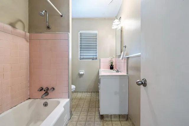 a bathroom with a sink and a toilet