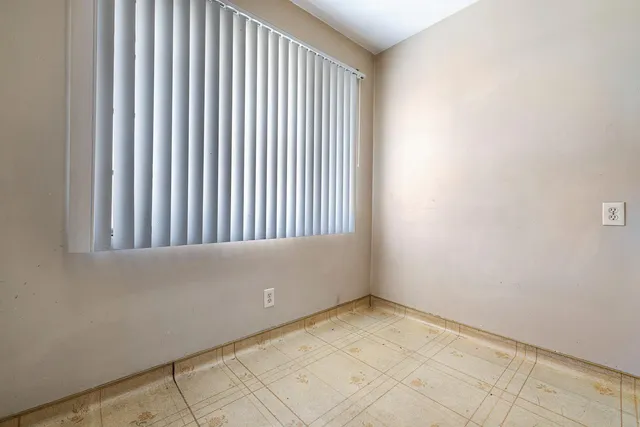a kitchen with a stove sink and refrigerator