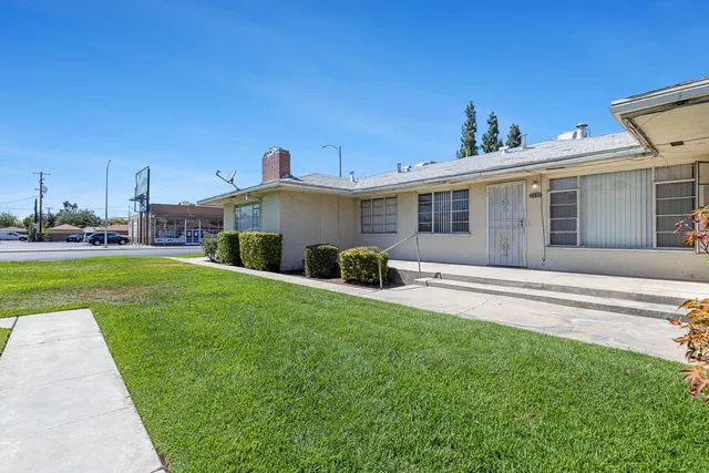 a view of a house with a swimming pool