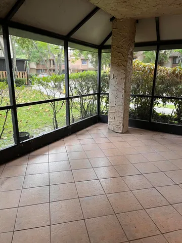 a view of a room and window