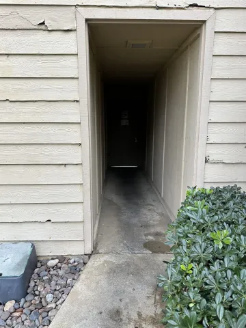a view of a house with a wooden door