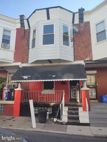 a front view of a building with street