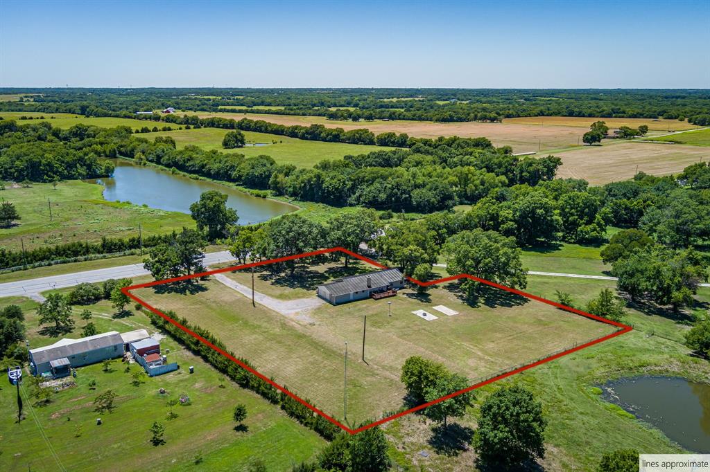 9778 Highway 11 Whitewright, TX 75491 - Photo 5 of 37 an outdoor space with patio swimming pool and outdoor seating