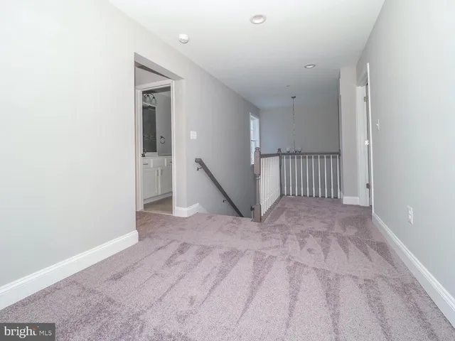 a view of a hallway with entryway