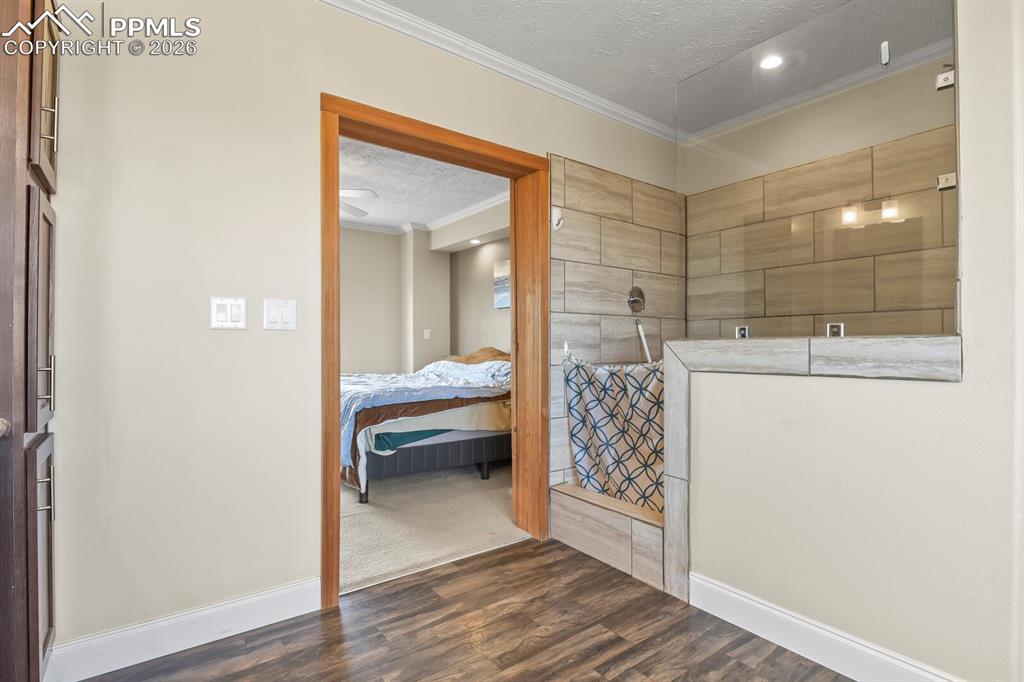 5895 Bar 10 Road Colorado Springs, CO 80928 - Photo 15 of 50 a bathroom with a sink and a mirror