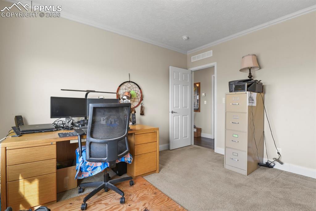 5895 Bar 10 Road Colorado Springs, CO 80928 - Photo 19 of 50 a view of a storage & utility room with closet