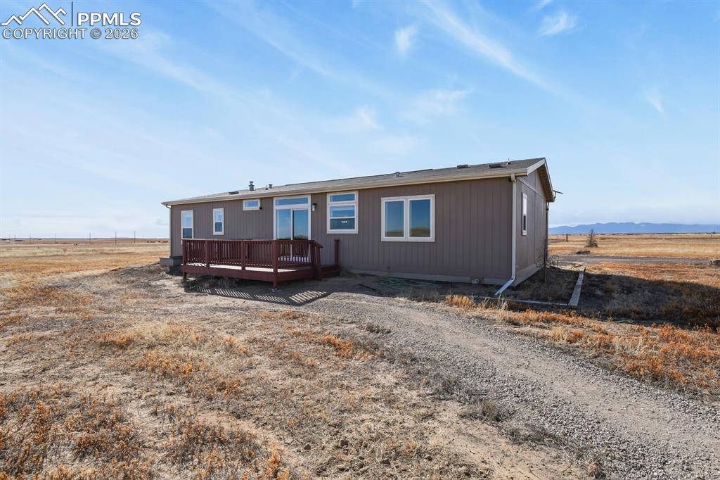 5895 Bar 10 Road Colorado Springs, CO 80928 - Photo 29 of 50 a house view with a backyard space