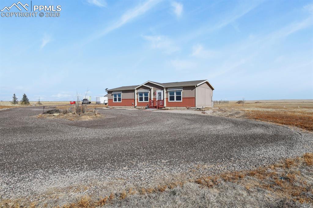 5895 Bar 10 Road Colorado Springs, CO 80928 - Photo 30 of 50 a view of houses with outdoor space
