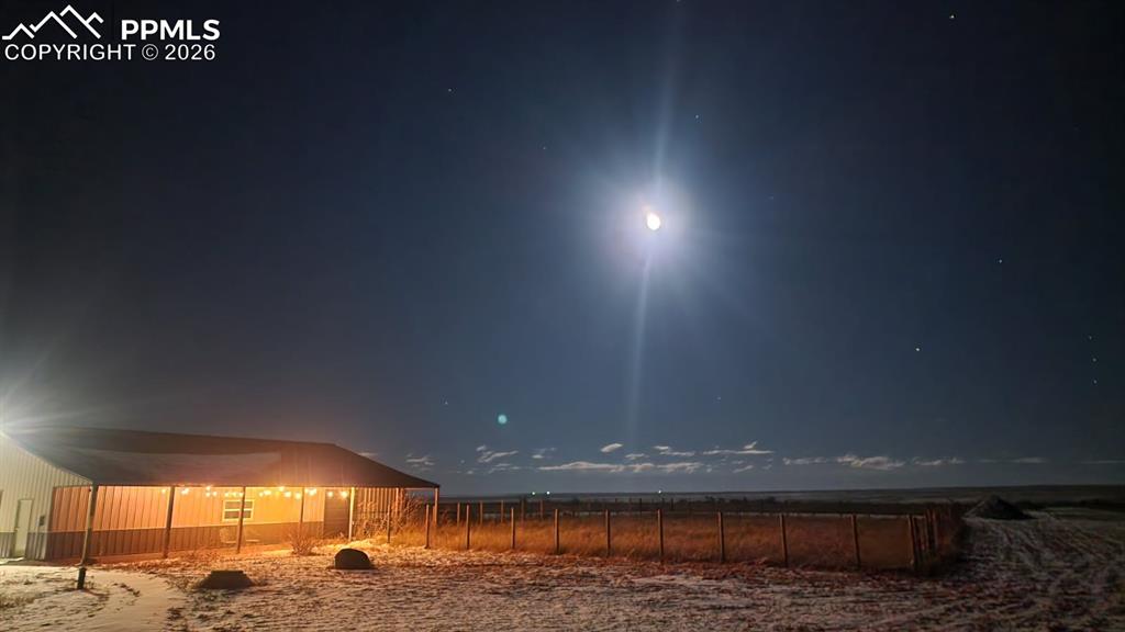 5895 Bar 10 Road Colorado Springs, CO 80928 - Photo 33 of 50 a view of lot of a lake