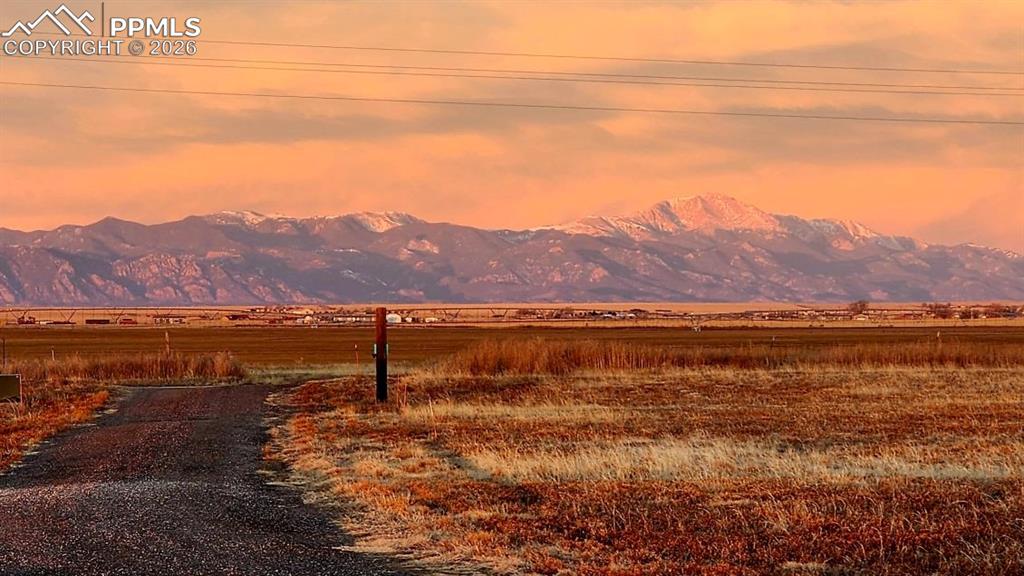 5895 Bar 10 Road Colorado Springs, CO 80928 - Photo 35 of 50 a view of a lake with mountain in the background