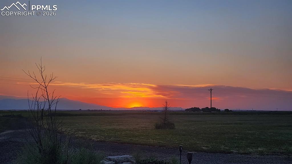 5895 Bar 10 Road Colorado Springs, CO 80928 - Photo 36 of 50 a view of an ocean and a yard