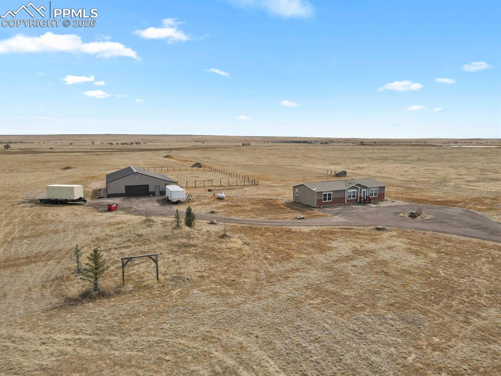 5895 Bar 10 Road Colorado Springs, CO 80928 - Photo 40 of 50 a view of an ocean and beach